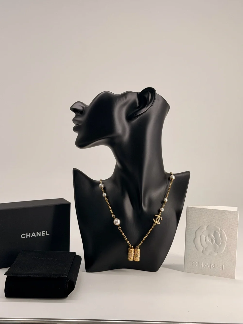 CHANEL Metal Crystal Pearl Airpod Necklace Gold